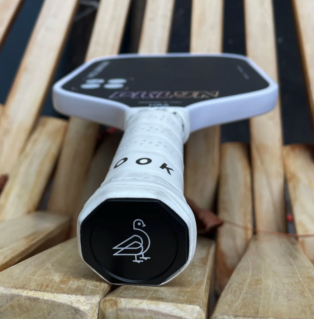 PKLYN x Holbrook collaboration paddle, showing the pigeon logo on the bottom of the handle